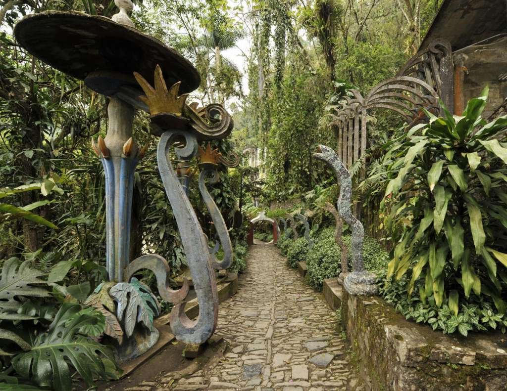 Las Pozas, Mexico. A forest of different flowers, trees, and architectural items