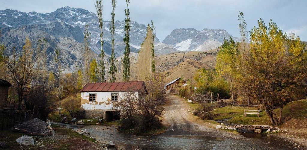 a house surrounded by trees in one of the best historical landmarks in Jalal-Abad