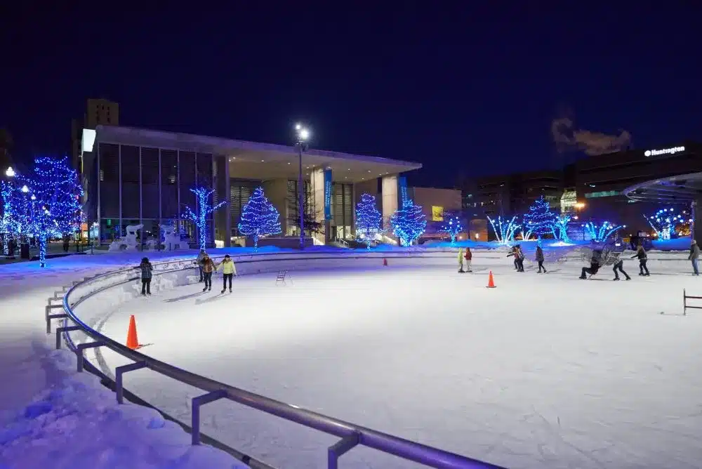 People running on skates in Rosa Park Circle Ice